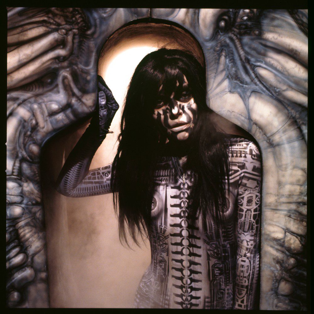 Debbie Harry wearing the stenciled body suit Giger designed for her to wear in the video for the track “Now I Know You Know”