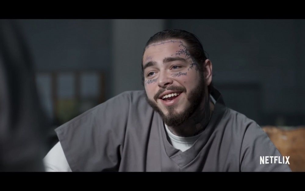 Watch Post Malone, Mark Wahlberg in Trailer for Netflix Action Movie